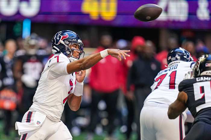 Texans quarterback C.J. Stroud (7) passes the ball against the Atlanta Falcons at Mercedes-Benz Stadium